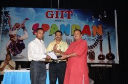 2nd Topper in (BscIT-3) Award to Ravindra Ravi Das by Mr. Dineshanand Goswami with Mr. Om Prakash Director GIIT